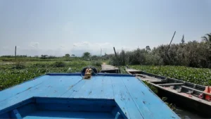 Per boot steek je de Thu Bon rivier over naar het authentieke platteland van Hoi An. 